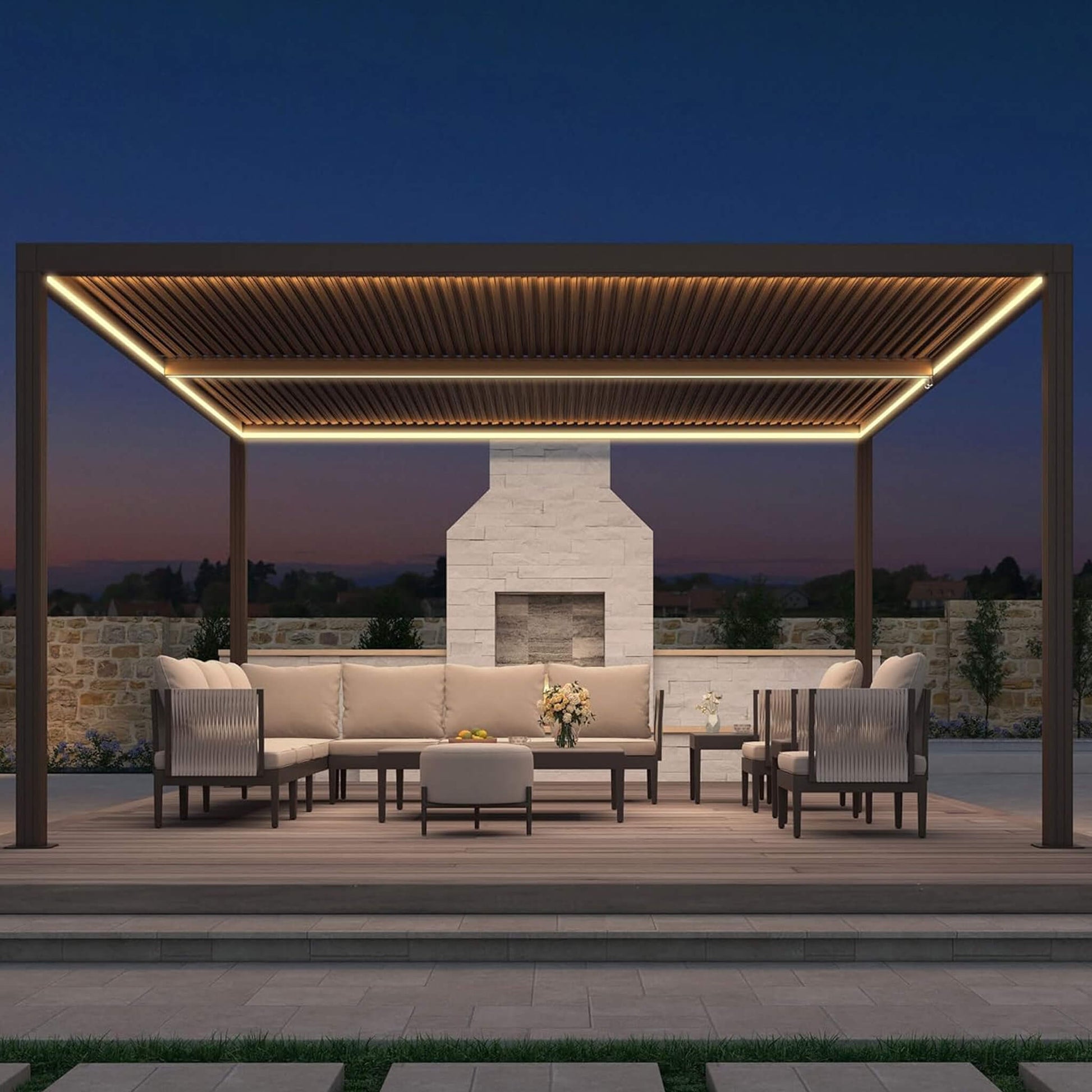 Outdoor patio with pergola, furniture, and fireplace at dusk.